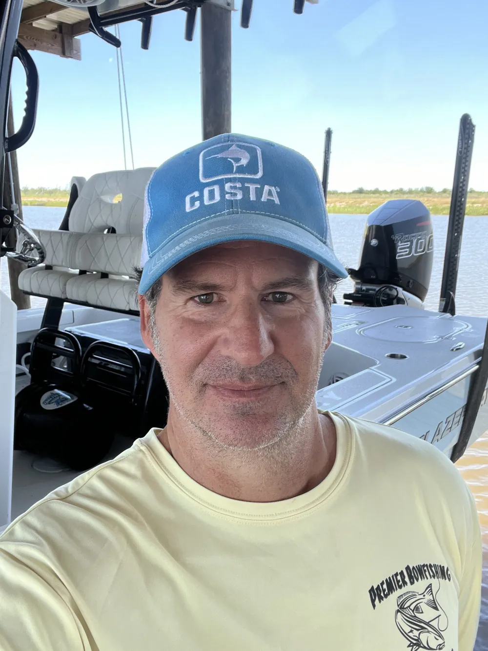Andre Savoie, founder of Saltwater Marketing, on a boat